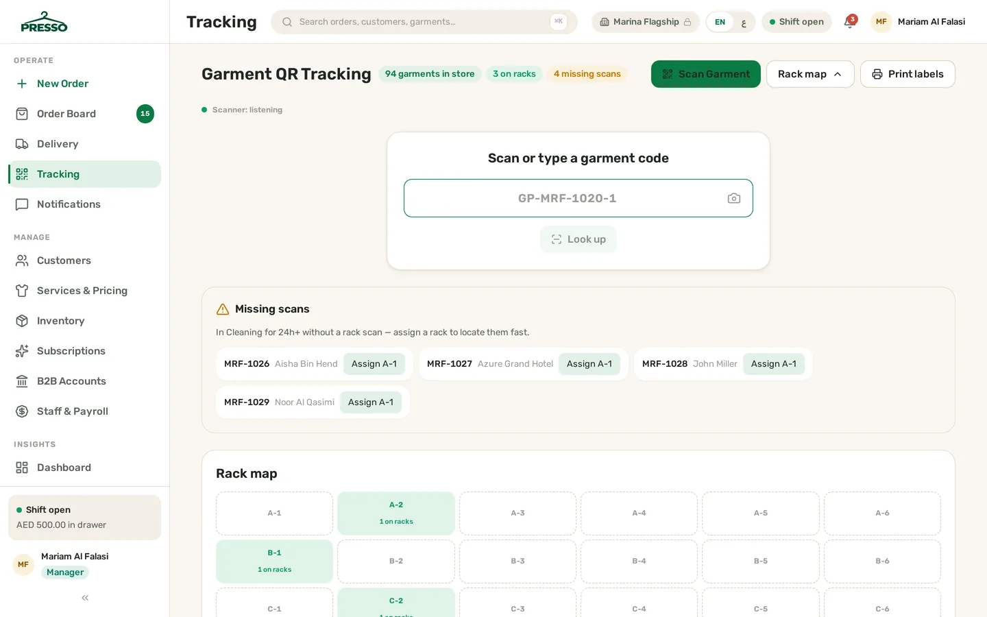 Presso garment tracking screen showing a laundry ticket's QR code, rack location assignment and stage timeline from received to ready